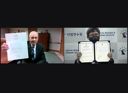 Dir. Cooke and President Kim - JRTI 50th Anniversary-spotlight.png